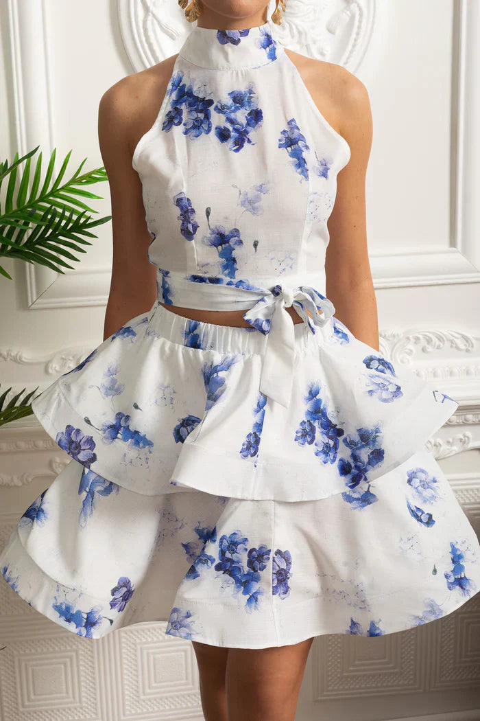 Conjunto – Top Estampado Sem Mangas  + Saia Curta Plissada de Cintura Alta