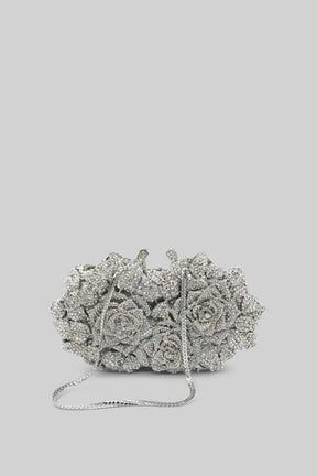 Bolsa clutch com enfeite de cristal